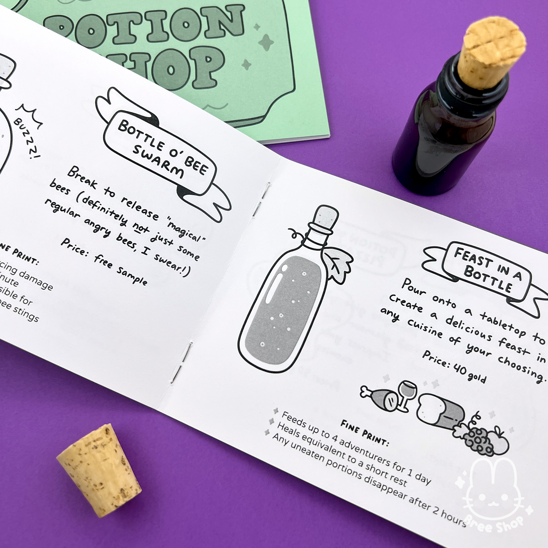 Potion Shop zines laying open showing several inside pages with various black and white illustrated potion bottles with descriptions. One of them is a "Feast in a bottle".